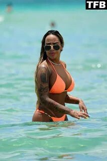 Rafaella Santos is Seen in a Peach Bikini at the Beach in Mi