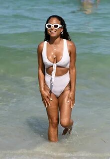 Christina Milian in a White Bikini on the Beach in Miami 04/