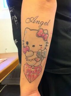 50+ Cutest Hello Kitty Tattoo Design For Girls - Zic Life