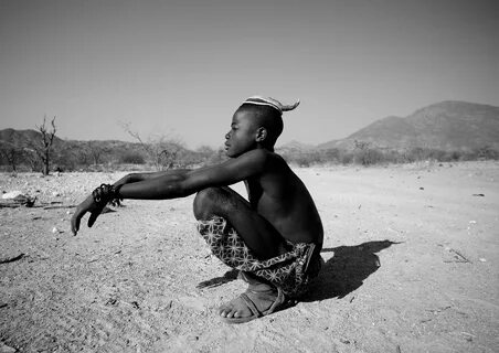 Muhimba tribe boy - Angola He was walking in a remote area. 