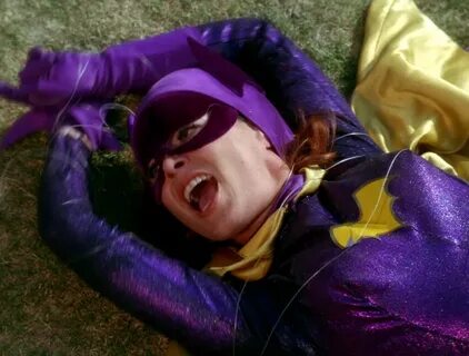 Yvonne Craig as Batgirl tied up on the lawn in "The Joke's. 