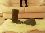 Dirty Gray Ugg Boots on Sheepskin Rug Uggs stay off couch.. 
