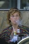SmokingCelebs.com--Milla Jovovich smoking cigarettes