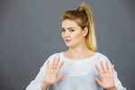Woman Deny Something Showing Stop Gesture with Hands Stock P