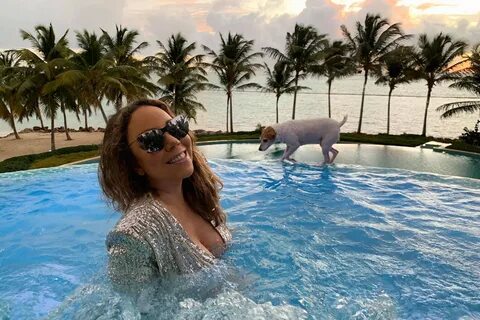 Mariah Carey goes swimming in sexy sequin dress