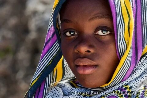 Swahili girl in kanga, Zanzibar. Photo by Robin Batista