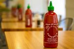 File:Sriracha Hot Sauce Bottles Freshii Restaurant Family Di