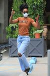 Kelly Rowland in Ripped Jeans - Shopping for house plants in
