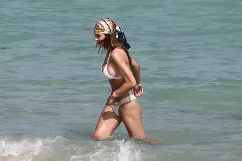 Amelia Hamlin - In a white bikini on the beach on Valentine'