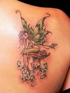 Attractive Colorful Fairy On Mushroom Tattoo On Right Back S