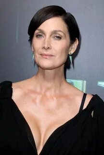 Carrie-Anne Moss In Plunging Gown At The Matrix Resurrection