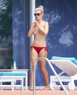 Real Housewife Joanna Krupa's romantic topless swim - Real H