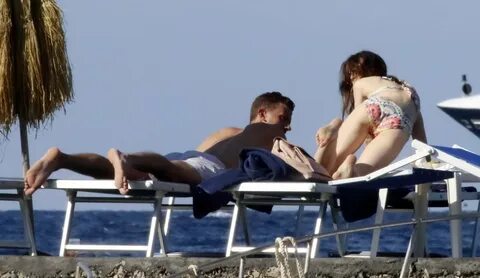lily collins in a bikini spotted with a mystery guy at a bea