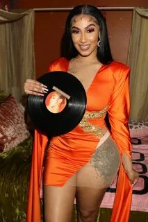 Queen Naija Shows Off Her Cleavage as She Releases Her Album