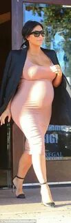 Kim Kardashian shows off very large bump in super tight Span