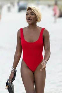 Elisa Johnson in a Red Swimsuit in Miami Beach 01/01/2019 * 