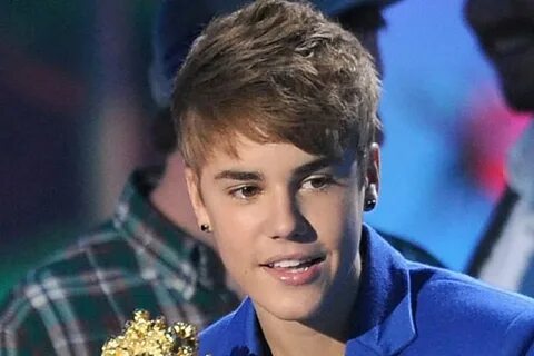 Justin Bieber Sports Studded Earrings at 2011 MTV Movie Awar