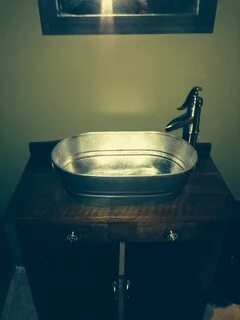 DIY old dry sink with a galvanized washtub as the sink and w
