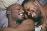 Black Gay Male Couple At Home In Bed by Joselito Briones
