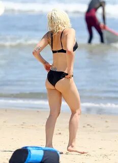 Lady Gaga In a black two piece bikini while frolicking in th