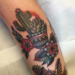 Traditional cactus tattoo on the calf.