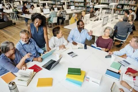Student help studying mature people Stock Photo by © Rawpixe