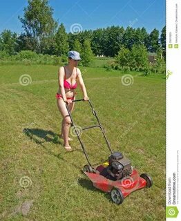 Woman mowing grass stock image. Image of push, adult - 33618
