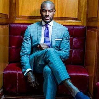 Tyson Beckford in Uptown Magazine. Blue pin stripe suit. Tys