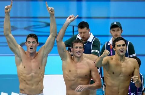 US swimmers Conor Dwyer, Ryan Lochte, and Ricky Berens showe