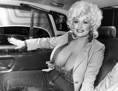 Nude photo of dolly parton 🔥 Dolly Parton, 75, bares cleavag