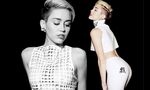 Miley Cyrus displays her breasts in mesh and her derriere in