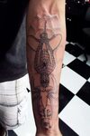 Spider web arm tattoo