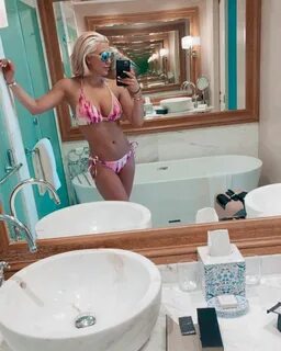 Savannah Chrisley Defends Bikini Photos Amid Enhancement Com