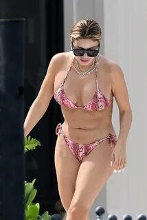 Larsa Pippen - In a pink snakeskin bikini in Ft. Lauderdale-