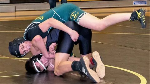 Men Wrestling Women: female wrestler pins male in epic battle on the mat