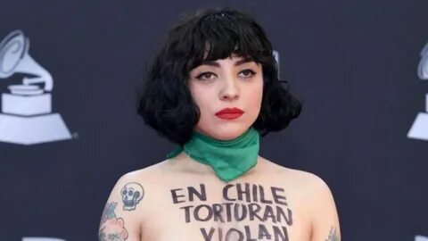 Mon laferte sexy 💖 Mon Laferte staged a topless protest agai
