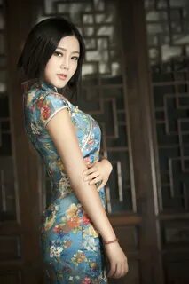 Best 12 Blue cheongsam girl HD Photo Traditional Plum Blosso