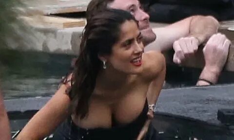 Curvaceous Salma Hayek struggles to contain ample cleavage i