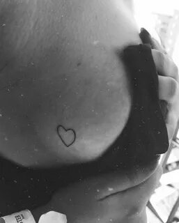 Little heart tattoo boob