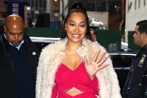 La La Anthony Goes Wild in Animal Print Dress & Crocodile Boots on &apo