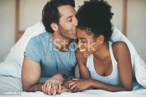 Black Couple In Bed - Сток картинки - iStock