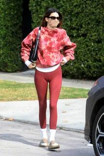 Kendall Jenner looks fab in a red tie-dye sweatshirt with ma