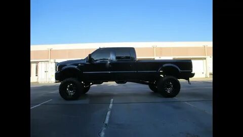 Monster Harley F250 12.5" lift with 40's - YouTube