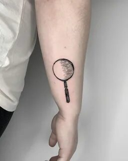 Sherlock Holme’s magnifying glass tattoo by Conz Thomas - Ta