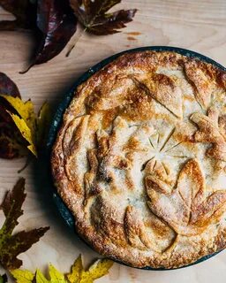 asian pear and apple pie with decorative leafy crust
