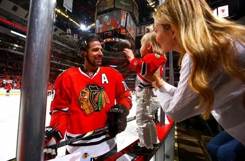 Patrick Sharp says hello to his wife Abby and daughter Madel