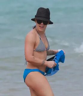 Pink showing off her hot bikini body at the beach in Miami