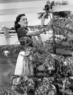maureen o'sullivan decorates her christmas tree 1939 #vintag