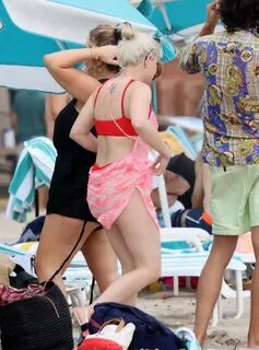 Ariel Winter wearing red thong bikini under a tiny see-thru 