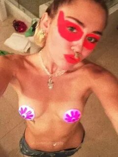 Майли Сайрус (Miley Cyrus) со светящимися наклейками - Nudog